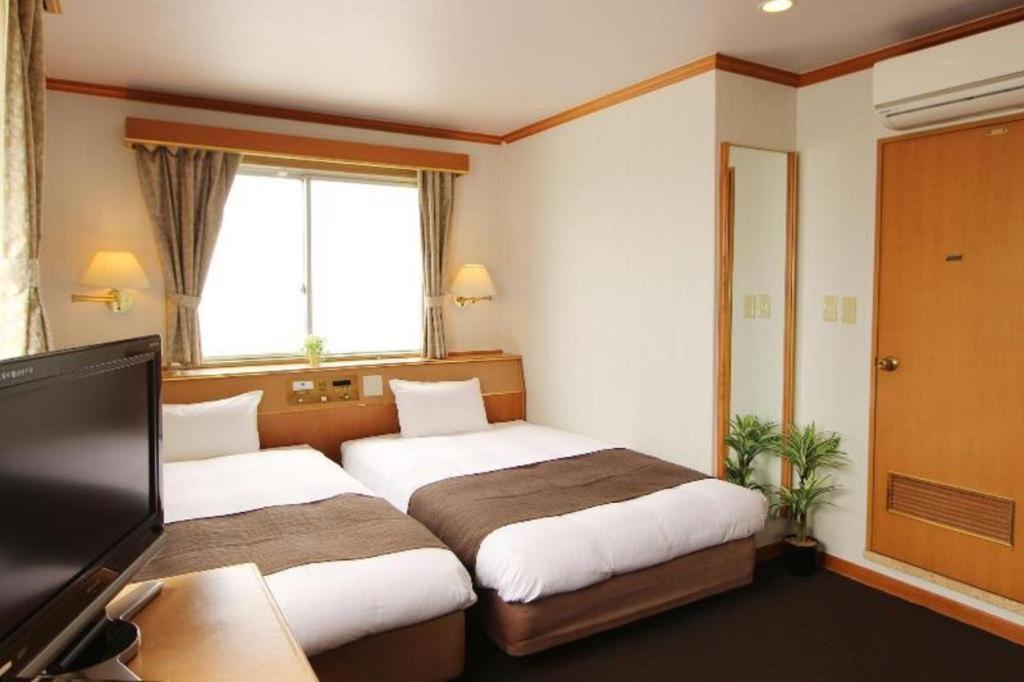Hotel Livemax Budget Naha Tomarikou Екстер'єр фото
